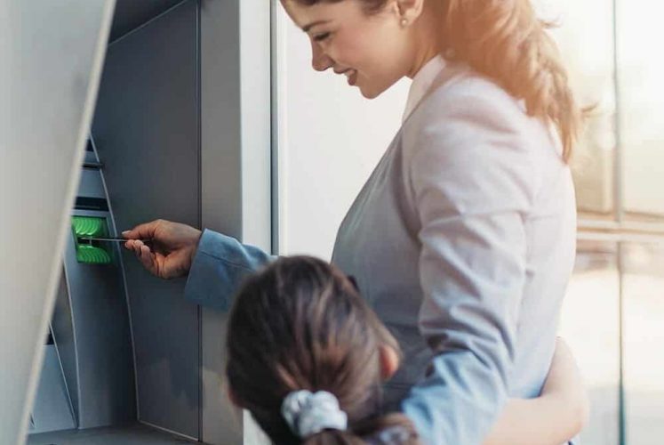 Woman at ATM